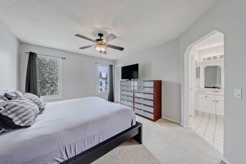 36 Mt Selkirk Close Se, Calgary, AB - Indoor Photo Showing Bedroom