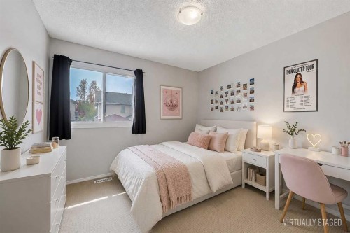 36 Mt Selkirk Close Se, Calgary, AB - Indoor Photo Showing Bedroom