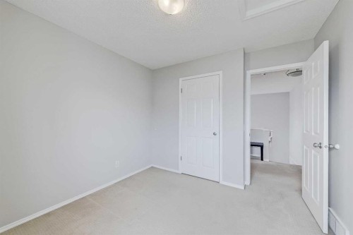 36 Mt Selkirk Close Se, Calgary, AB - Indoor Photo Showing Other Room
