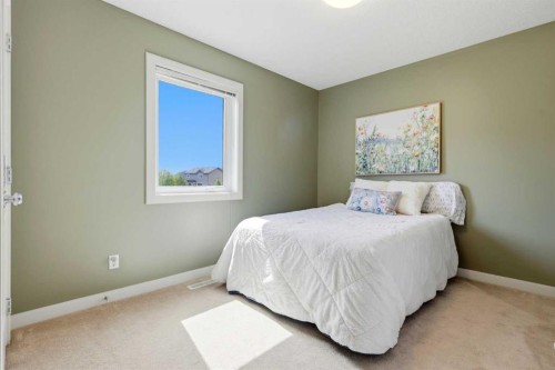 1605 Montgomery Way Se, High River, AB - Indoor Photo Showing Bedroom