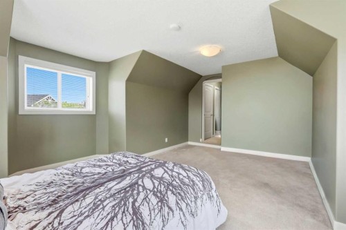 1605 Montgomery Way Se, High River, AB - Indoor Photo Showing Bedroom