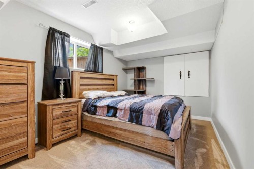 1605 Montgomery Way Se, High River, AB - Indoor Photo Showing Bedroom