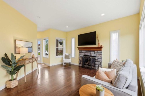 1605 Montgomery Way Se, High River, AB - Indoor Photo Showing Living Room With Fireplace
