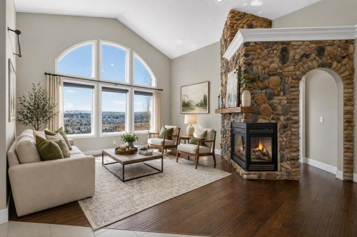 158 Hidden Creek Heights Nw, Calgary, AB - Indoor Photo Showing Living Room With Fireplace