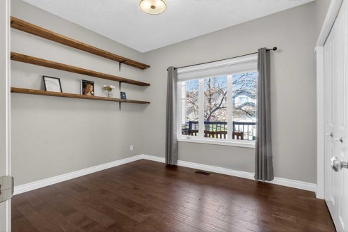 158 Hidden Creek Heights Nw, Calgary, AB - Indoor Photo Showing Other Room