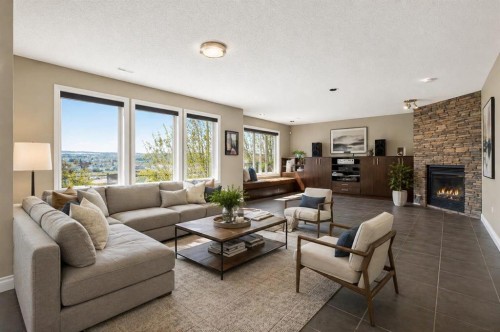 158 Hidden Creek Heights Nw, Calgary, AB - Indoor Photo Showing Living Room With Fireplace