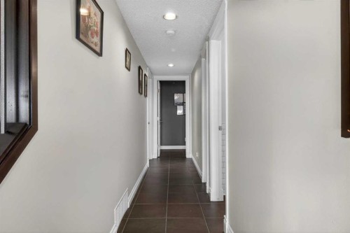 158 Hidden Creek Heights Nw, Calgary, AB - Indoor Photo Showing Other Room