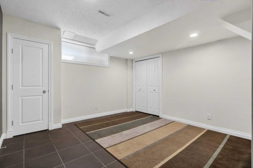 158 Hidden Creek Heights Nw, Calgary, AB - Indoor Photo Showing Other Room