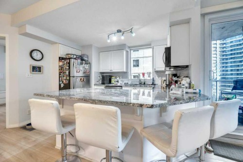 701-683 10 Street Sw, Calgary, AB - Indoor Photo Showing Kitchen With Stainless Steel Kitchen