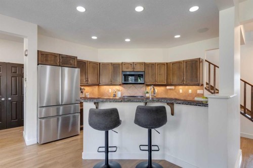 107 Aspen Stone Crescent Sw, Calgary, AB - Indoor Photo Showing Kitchen With Upgraded Kitchen