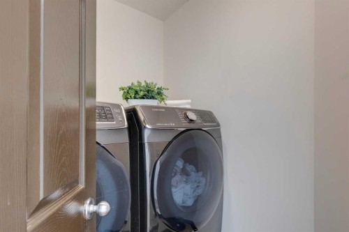 107 Aspen Stone Crescent Sw, Calgary, AB - Indoor Photo Showing Laundry Room