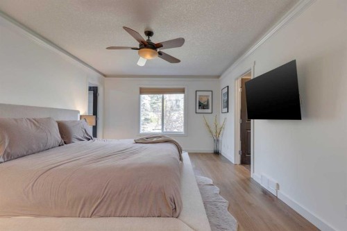 107 Aspen Stone Crescent Sw, Calgary, AB - Indoor Photo Showing Bedroom