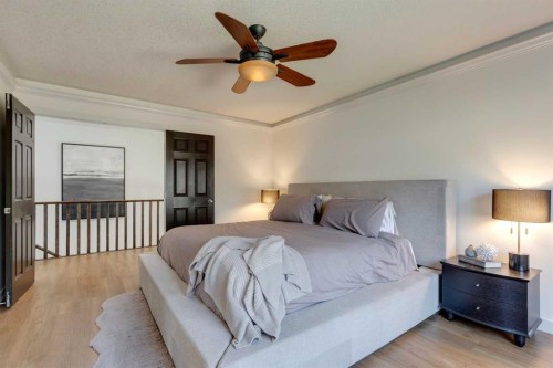 107 Aspen Stone Crescent Sw, Calgary, AB - Indoor Photo Showing Bedroom