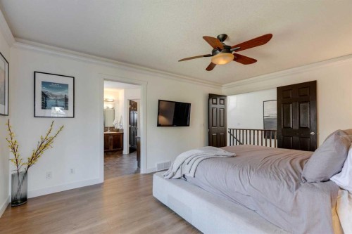 107 Aspen Stone Crescent Sw, Calgary, AB - Indoor Photo Showing Bedroom