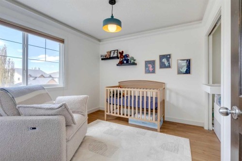 107 Aspen Stone Crescent Sw, Calgary, AB - Indoor Photo Showing Bedroom