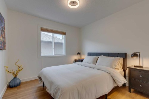 107 Aspen Stone Crescent Sw, Calgary, AB - Indoor Photo Showing Bedroom