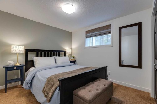 107 Aspen Stone Crescent Sw, Calgary, AB - Indoor Photo Showing Bedroom