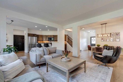 107 Aspen Stone Crescent Sw, Calgary, AB - Indoor Photo Showing Living Room
