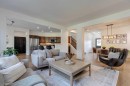 107 Aspen Stone Crescent Sw, Calgary, AB  - Indoor Photo Showing Living Room 