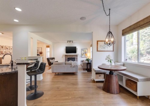 107 Aspen Stone Crescent Sw, Calgary, AB - Indoor With Fireplace