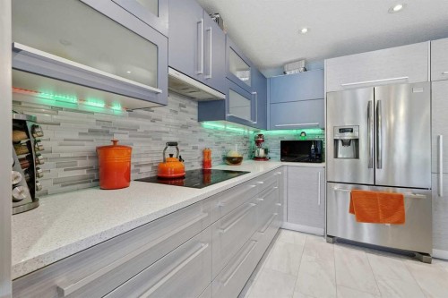 804 Downey Place, Okotoks, AB - Indoor Photo Showing Kitchen With Stainless Steel Kitchen