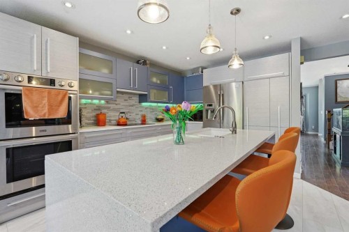 804 Downey Place, Okotoks, AB - Indoor Photo Showing Kitchen With Stainless Steel Kitchen With Upgraded Kitchen