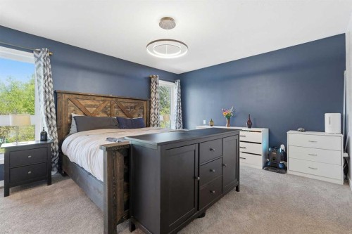 804 Downey Place, Okotoks, AB - Indoor Photo Showing Bedroom