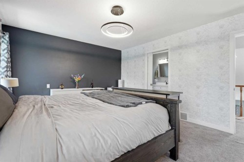 804 Downey Place, Okotoks, AB - Indoor Photo Showing Bedroom