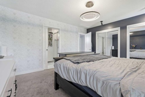 804 Downey Place, Okotoks, AB - Indoor Photo Showing Bedroom