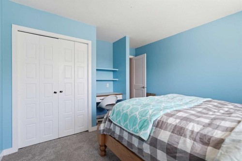 804 Downey Place, Okotoks, AB - Indoor Photo Showing Bedroom