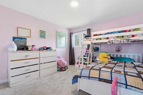 804 Downey Place, Okotoks, AB - Indoor Photo Showing Bedroom