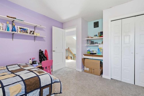 804 Downey Place, Okotoks, AB - Indoor Photo Showing Bedroom