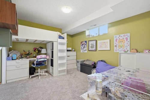 804 Downey Place, Okotoks, AB - Indoor Photo Showing Bedroom