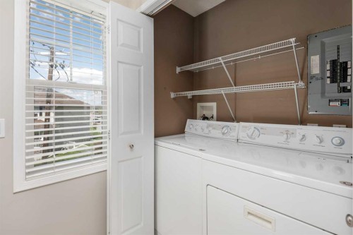 2504-7171 Coach Hill Road, Calgary, AB - Indoor Photo Showing Laundry Room