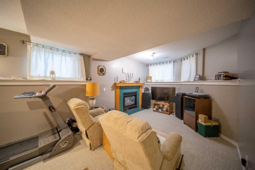 272 Covington Road Ne, Calgary, AB - Indoor With Fireplace