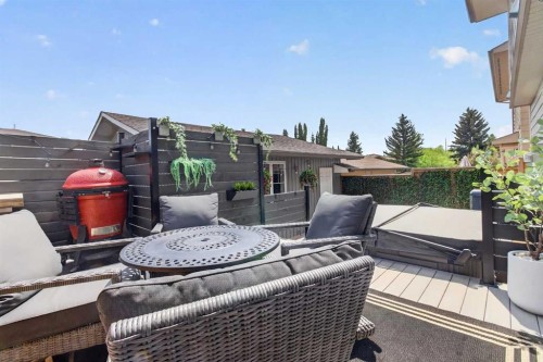 348 Midlake Boulevard Se, Calgary, AB - Outdoor With Deck Patio Veranda With Exterior