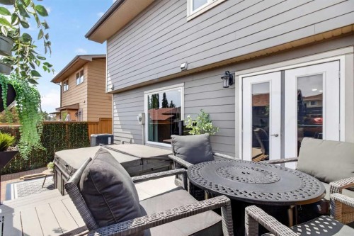 348 Midlake Boulevard Se, Calgary, AB - Outdoor With Deck Patio Veranda With Exterior
