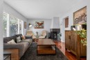 348 Midlake Boulevard Se, Calgary, AB  - Indoor Photo Showing Living Room 