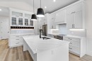 622 Mandalay Boulevard, Carstairs, AB  - Indoor Photo Showing Kitchen With Upgraded Kitchen 