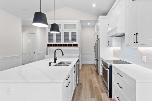 622 Mandalay Boulevard, Carstairs, AB - Indoor Photo Showing Kitchen With Double Sink With Upgraded Kitchen