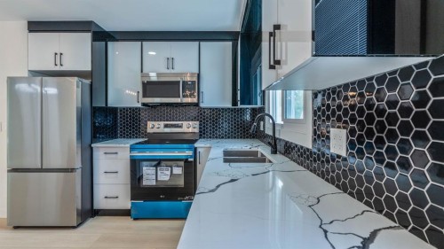 172 Pinewind Road Ne, Calgary, AB - Indoor Photo Showing Kitchen With Stainless Steel Kitchen