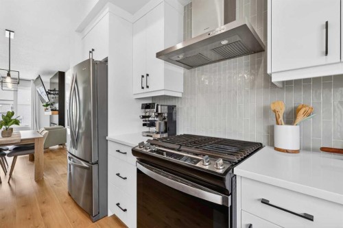 14 Wolf Creek Rise Se, Calgary, AB - Indoor Photo Showing Kitchen With Stainless Steel Kitchen