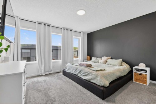 14 Wolf Creek Rise Se, Calgary, AB - Indoor Photo Showing Bedroom
