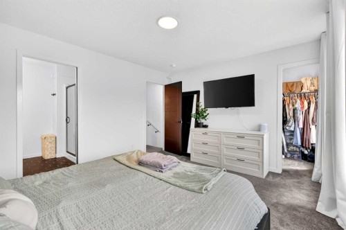 14 Wolf Creek Rise Se, Calgary, AB - Indoor Photo Showing Bedroom