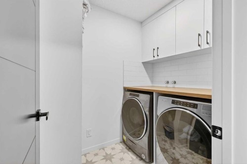 14 Wolf Creek Rise Se, Calgary, AB - Indoor Photo Showing Laundry Room