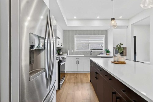 14 Wolf Creek Rise Se, Calgary, AB - Indoor Photo Showing Kitchen With Stainless Steel Kitchen