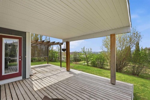 99 Sunset View, Cochrane, AB - Outdoor With Deck Patio Veranda With Exterior