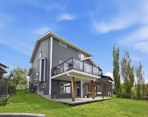 99 Sunset View, Cochrane, AB - Outdoor With Deck Patio Veranda