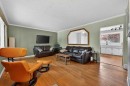 1632 Robson Crescent Se, Calgary, AB  - Indoor Photo Showing Living Room 