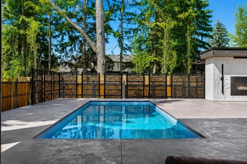 1016 Beverley Boulevard Sw, Calgary, AB - Outdoor With In Ground Pool